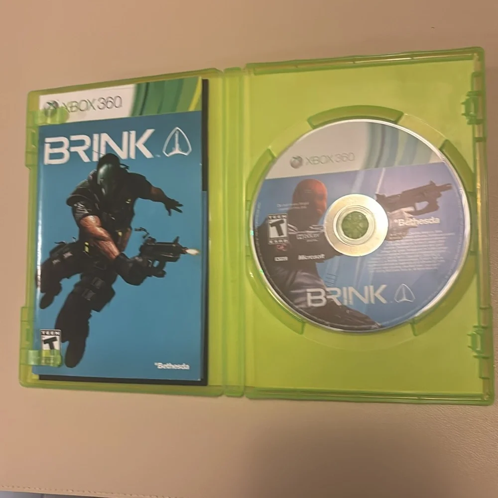 Revolution Brink for Xbox 360 - Green Case